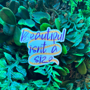 Product: 'Beautiful isn't a size' - Image of size sticker